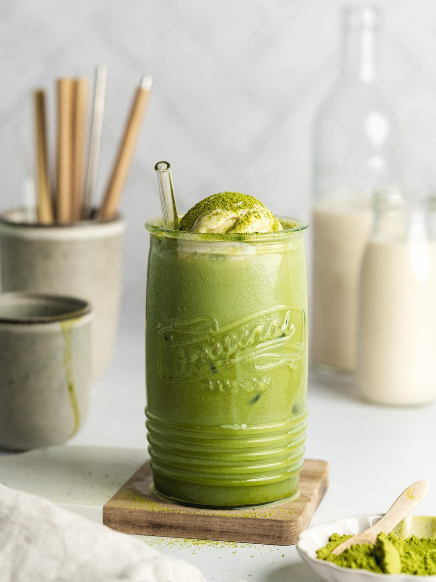 Whisked  organic matcha tea in a cup – natural energy boost and focus-enhancing superfood.